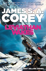 The top half of the cover is taken up by the author's name and the book title. In the background is a view of space with a blue tinge with earth visible at the top edge. There is a large asteroid at the top left corner and the bottom is entirely taken up by the edge of a ship. 