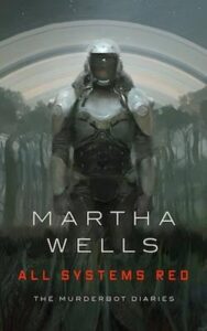 Murderbot is depicted on the cover and is in the shape of a human with grayish armor that covers it entirely including a helmet with face shield. In the background are rows of trees on either side and above are what looks like the rings of a planet. The author's name is at the bottom along with the title. 