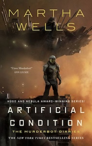 Murderbot is depicted on the cover and is in the shape of a human with grayish armor that covers it entirely including a helmet with face shield. It is standing on the edge of something that looks like a metal platform with yellow and brown clouds behind it. Above is spaceship mostly hidden in the clouds but visible. The author's name is at the top of the cover with the title at the bottom. 