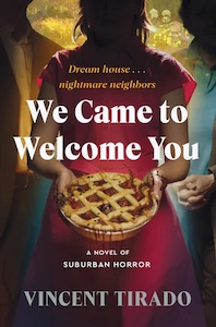 Cover of We Came to Welcome You with the title in the center of the cover. There are people on over visible from mid-face down though their faces are hidden in shadows. The one in the center is dressed in a pink dress and is holding a pie with lattice crust with red tentacles coming out through the holes. The other two figures are wearing a blue and yellow shirt respectively and are standing behind the center person. The author's name is at the bottom. 